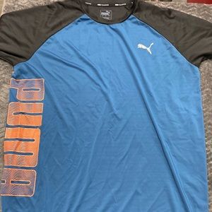 Puma training athletic top size large blue and black with logo